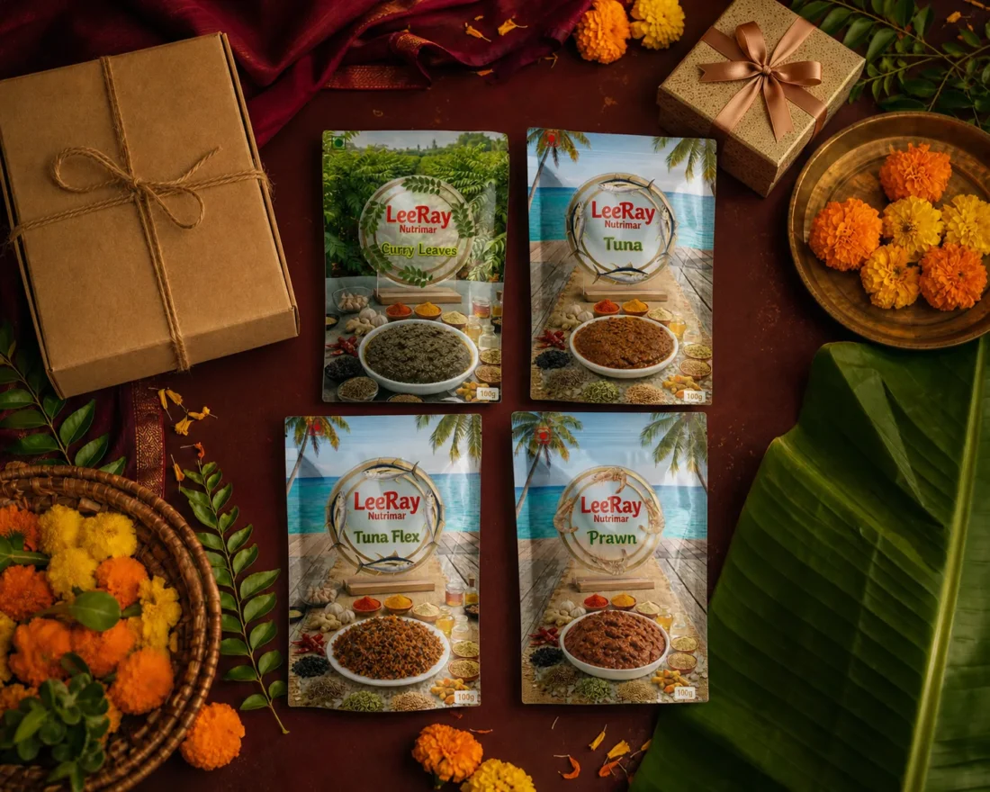 Festive gifting table with the four LeeRay Nutrimar pouches, brass lamp and marigolds